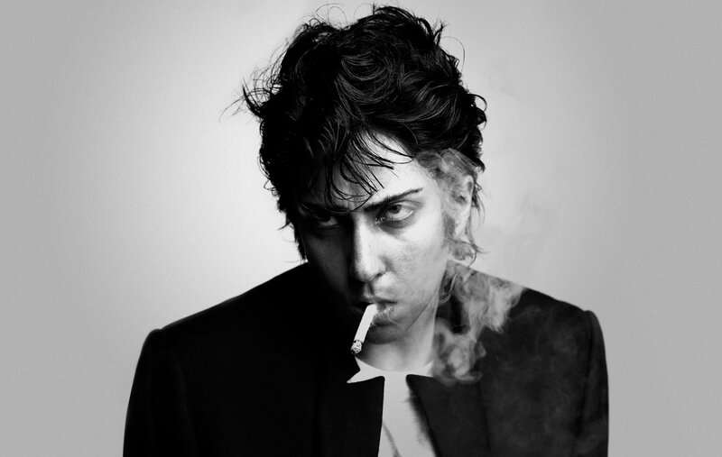 man smoking a cigarette
