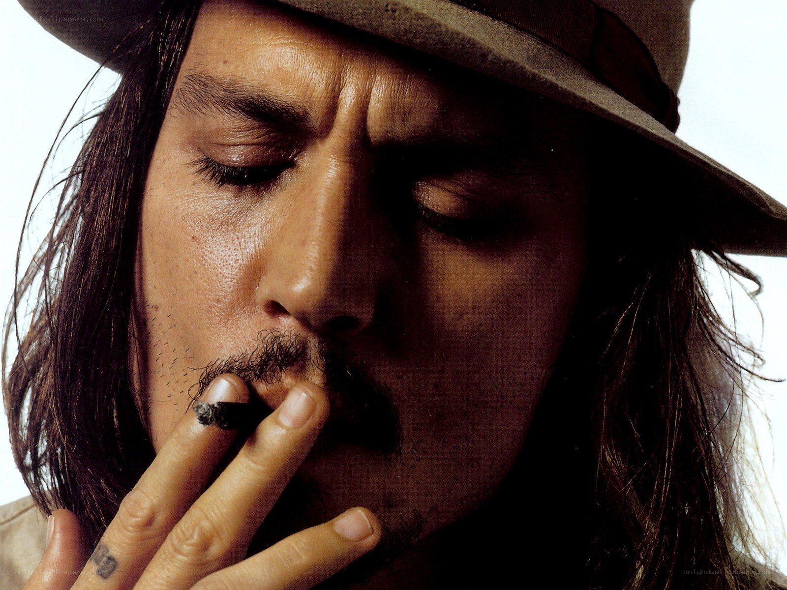 man smoking a cigarette