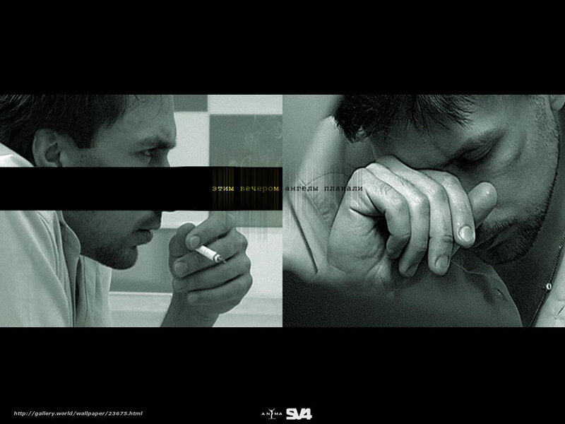 Man smoking and holding face
