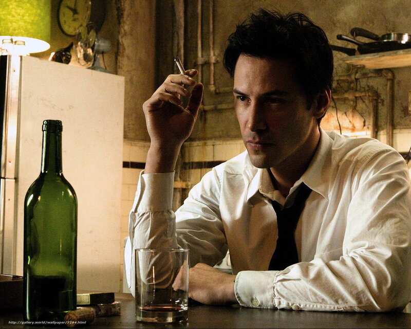 man smoking at a bar