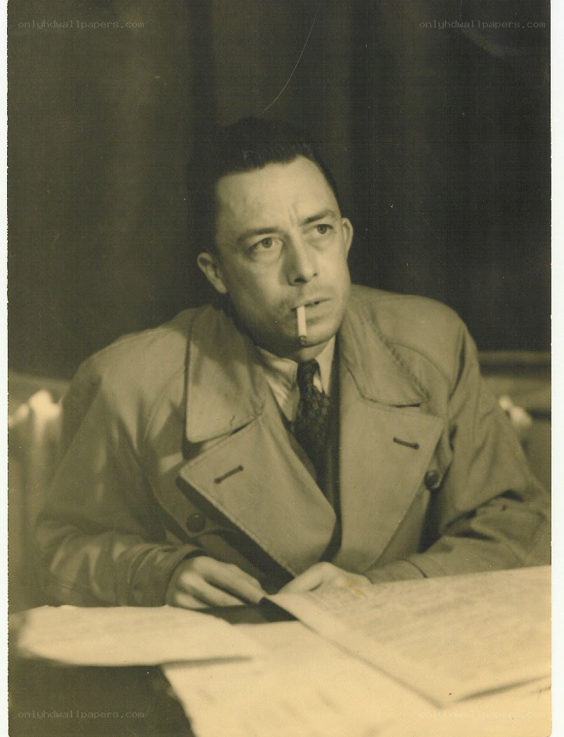 Man smoking at a desk