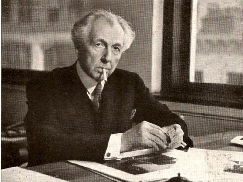 man smoking at desk