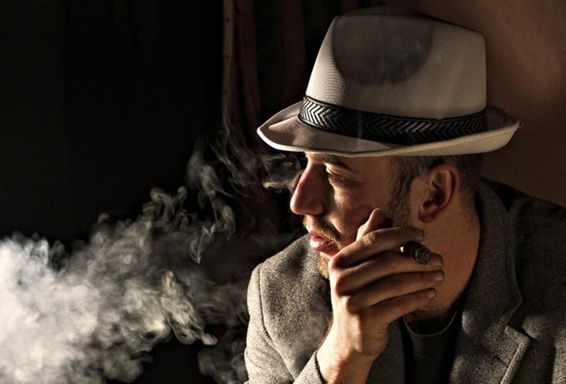 Man Smoking Cigar — Gray