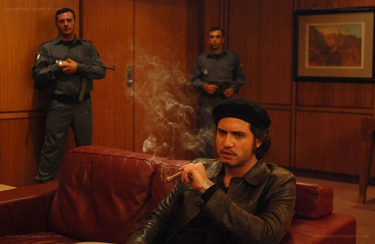 Man smoking cigar in office
