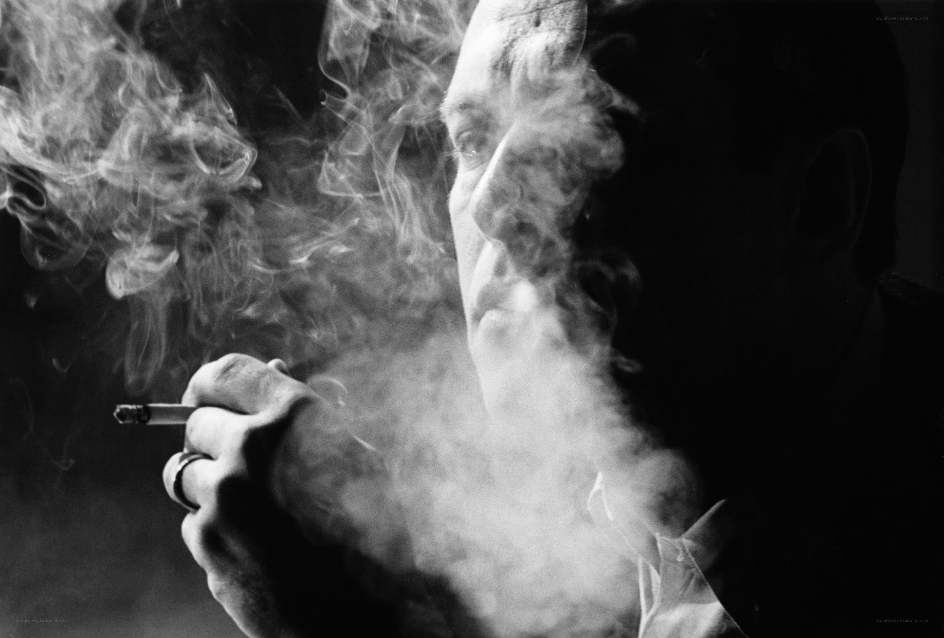 man smoking cigarette