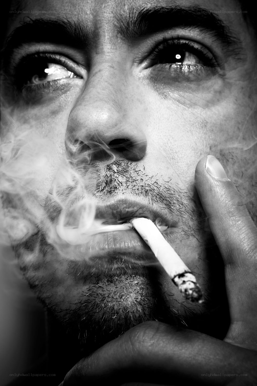 man smoking cigarette