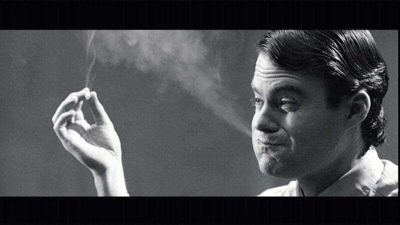 man smoking cigarette