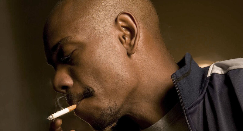 man smoking cigarette