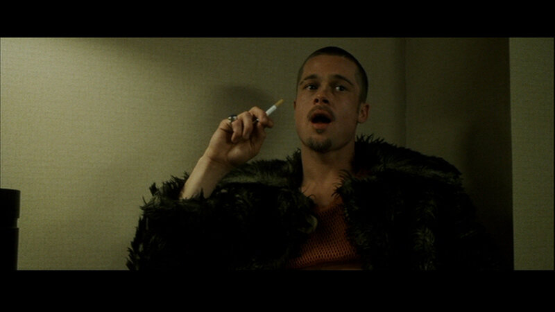 man smoking cigarette