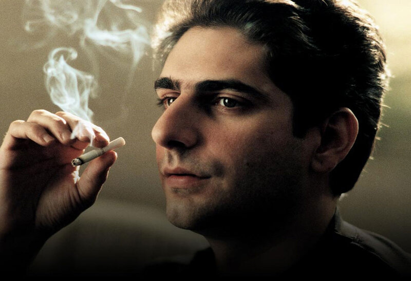 man smoking cigarette