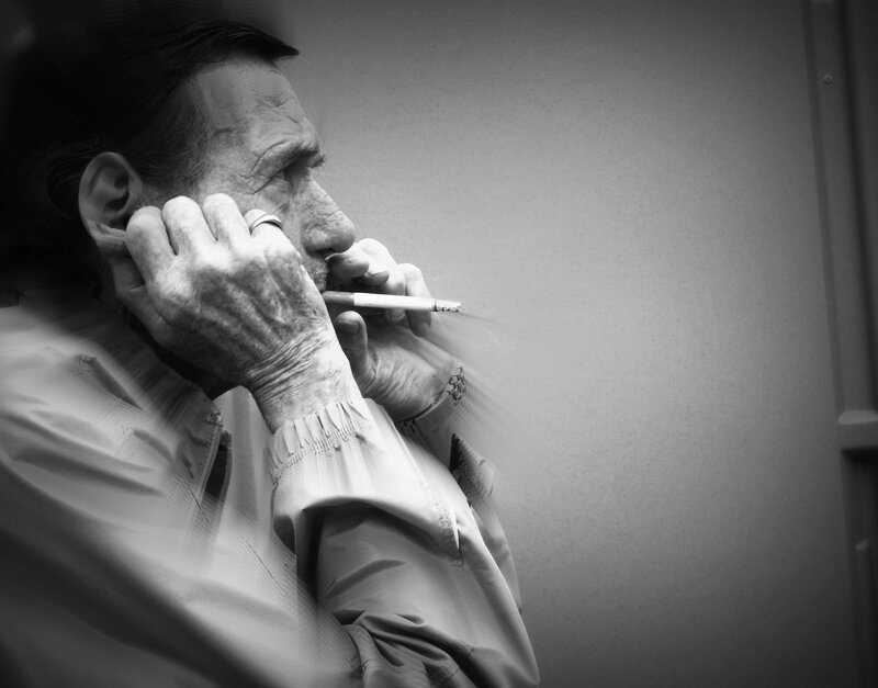 man smoking cigarette