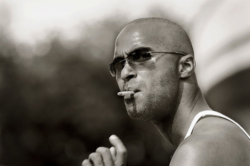 man smoking cigarette