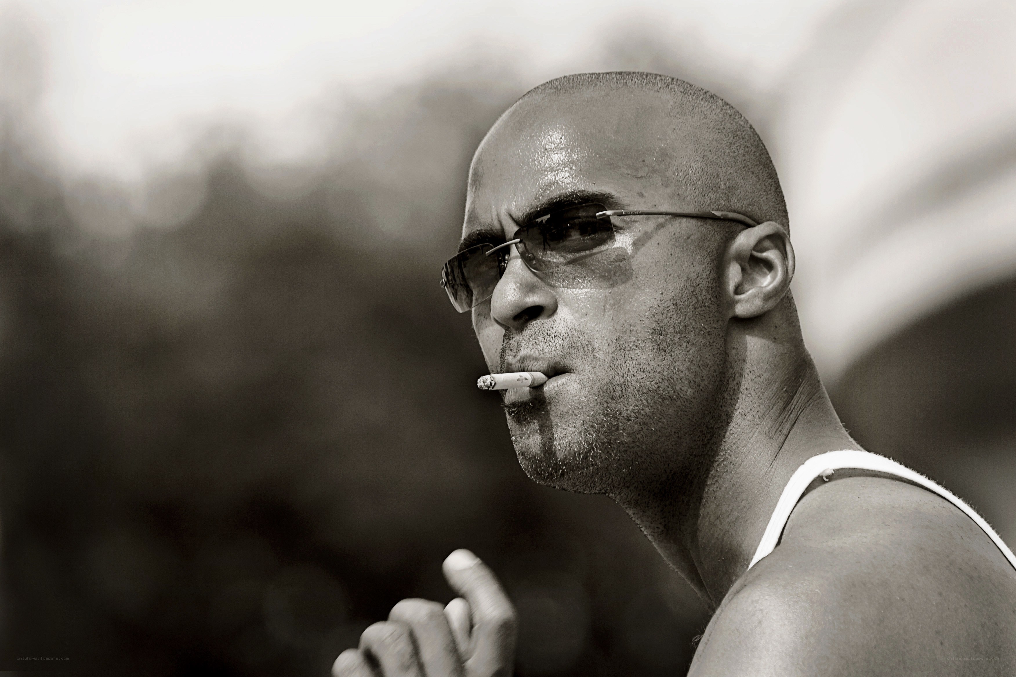 man smoking cigarette