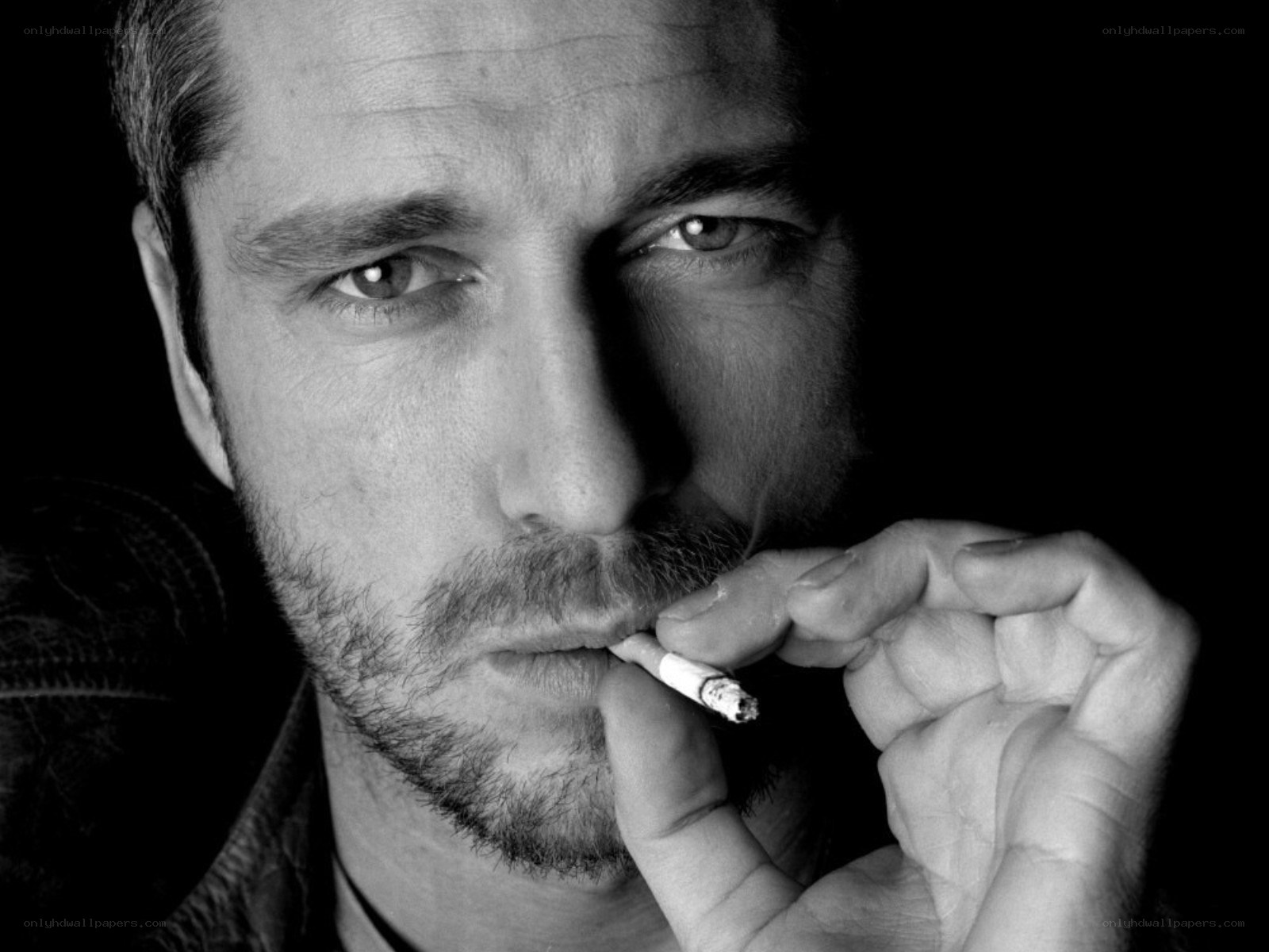 man smoking cigarette