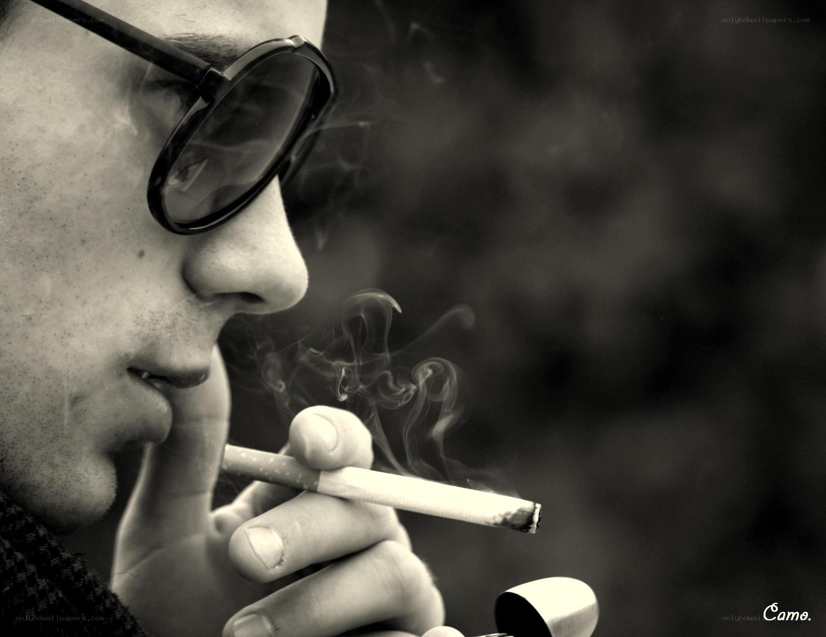 man smoking cigarette