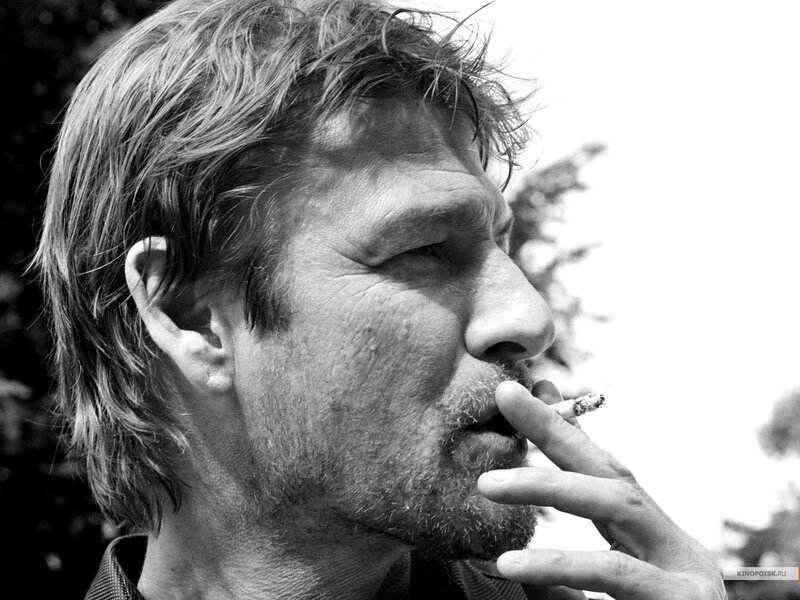 man smoking cigarette