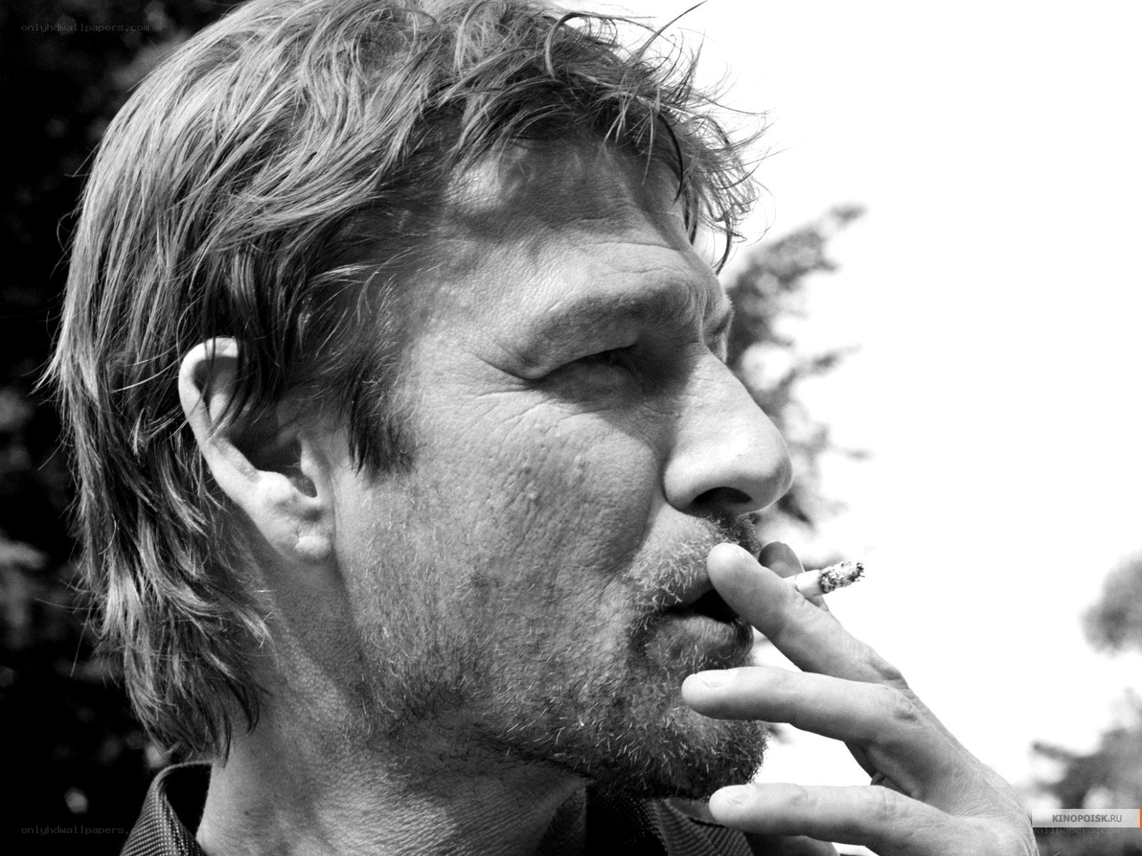 man smoking cigarette