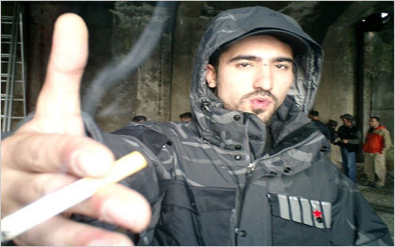 Man Smoking Cigarette — Gray