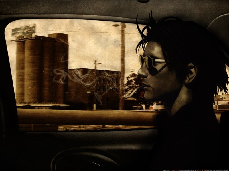 man smoking in car