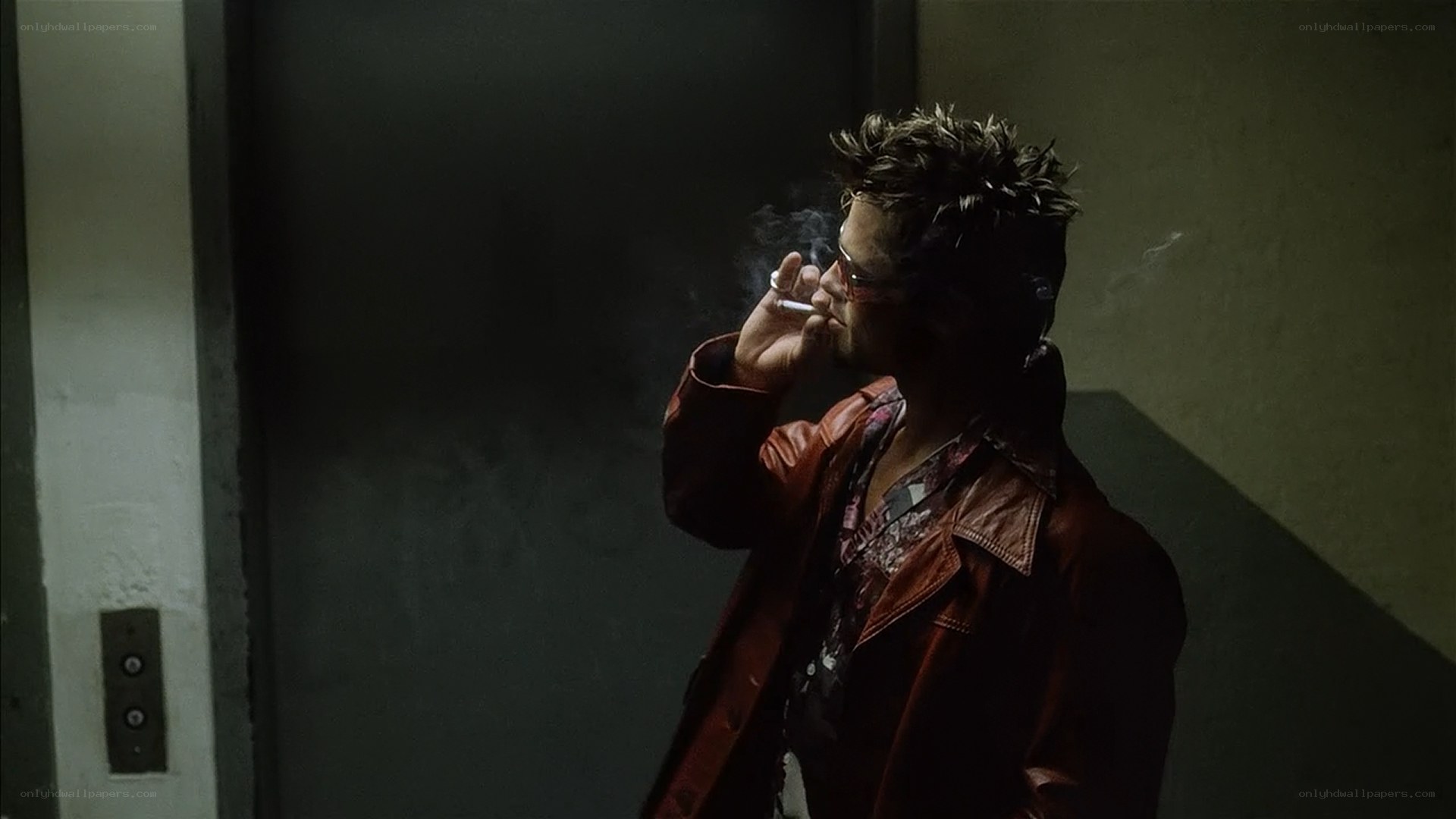 man smoking in elevator