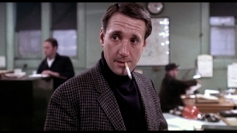 man smoking in office