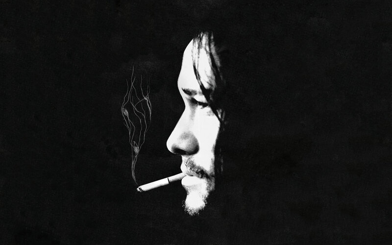 man smoking in profile