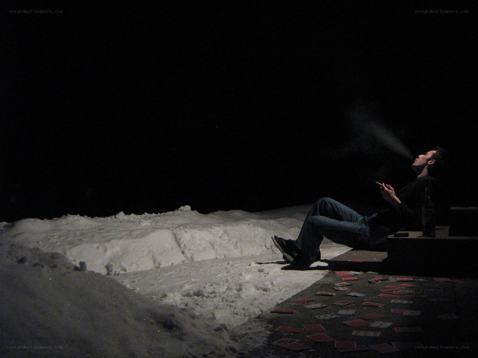 Man smoking in snowy scene