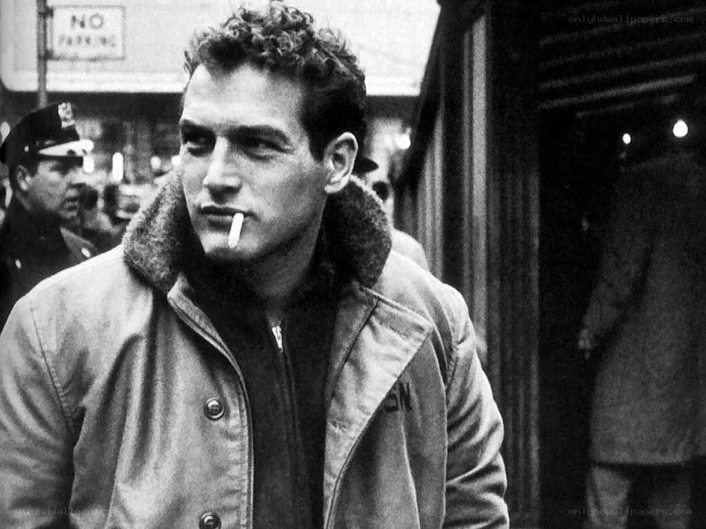 man smoking on street