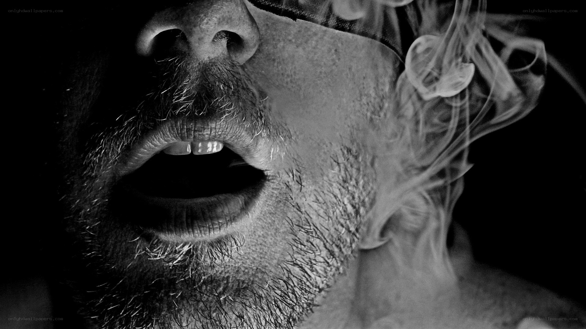 man smoking with smoke