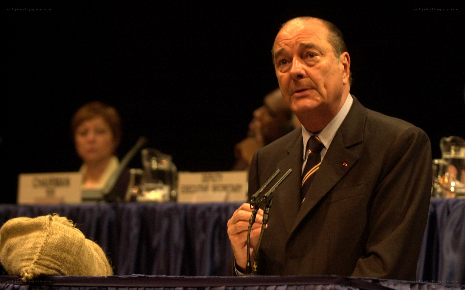 Man speaking at a conference