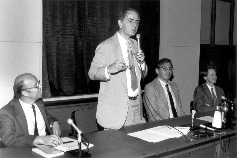 Man speaking at a panel discussion