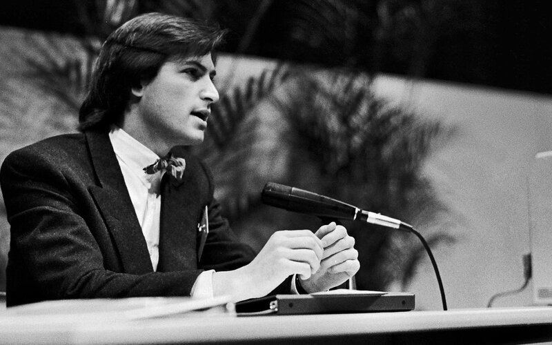 Man speaking at a podium