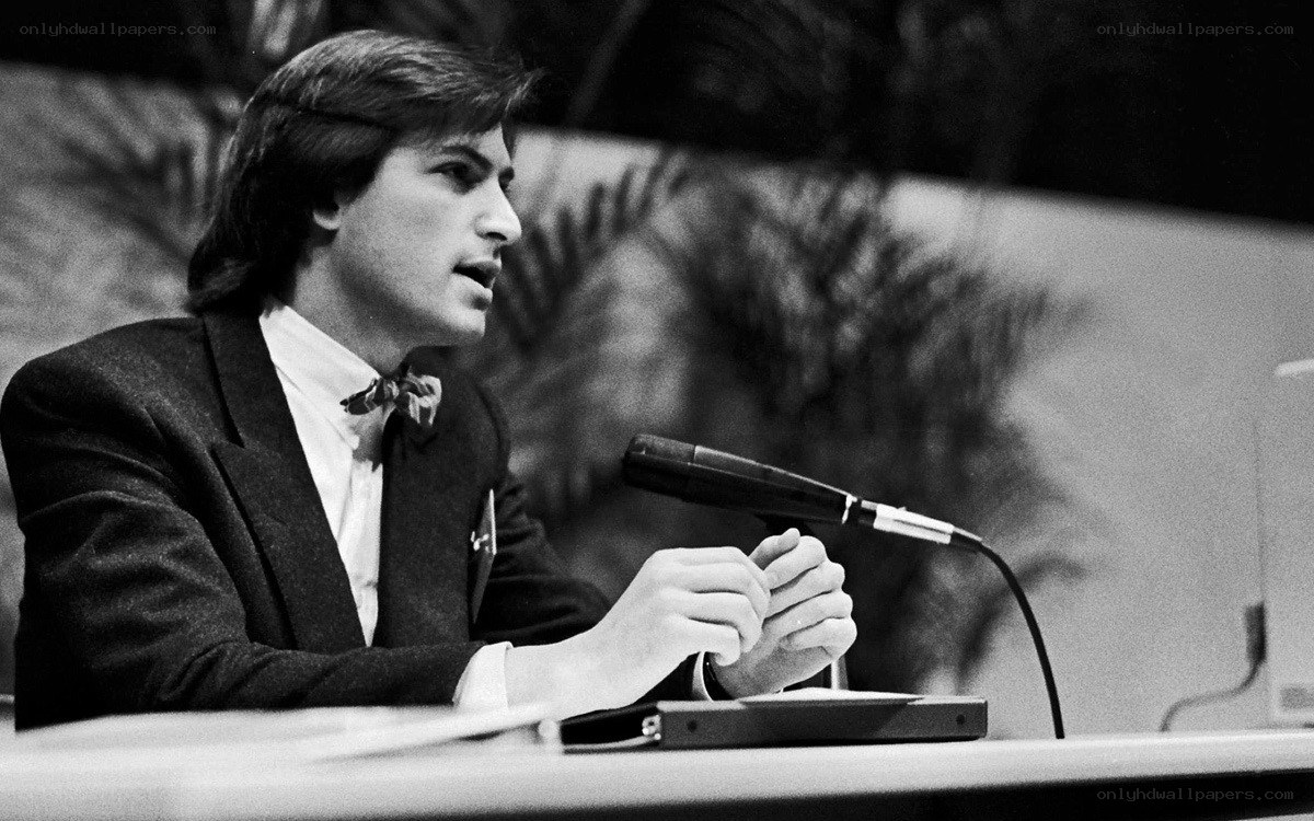 Man speaking at a podium