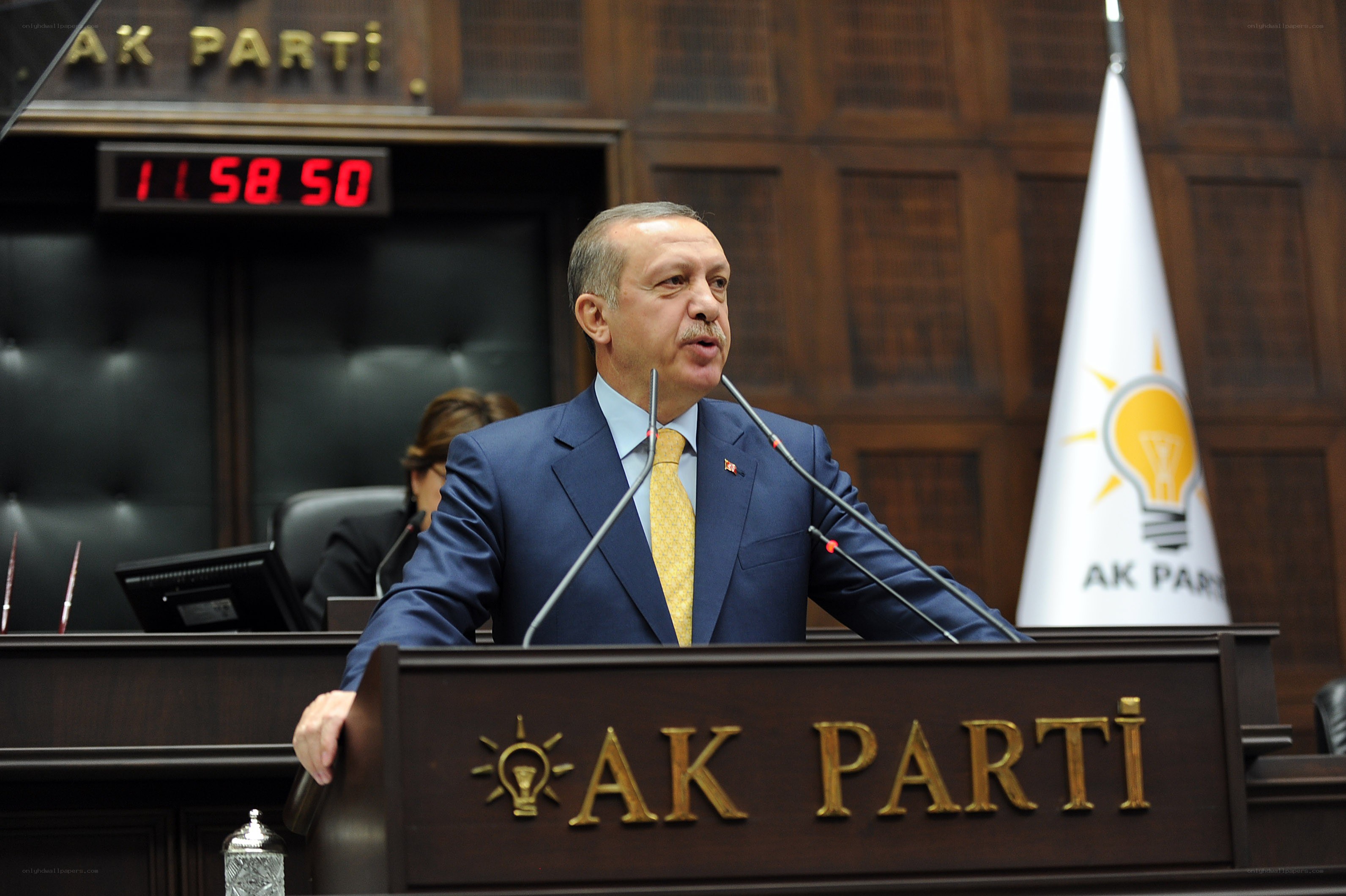 Man speaking at a podium