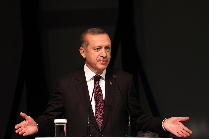 Man speaking at a podium