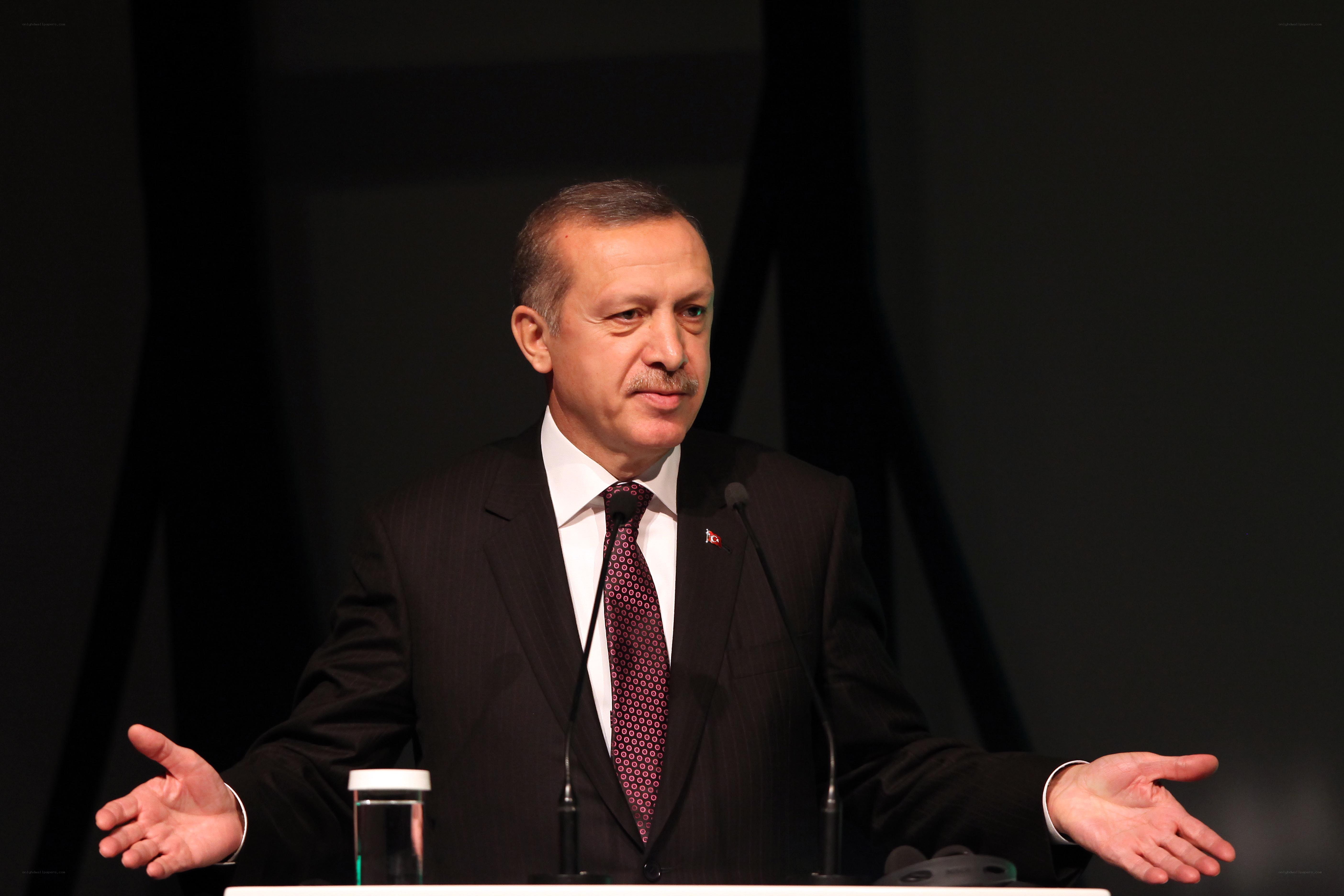 Man speaking at a podium