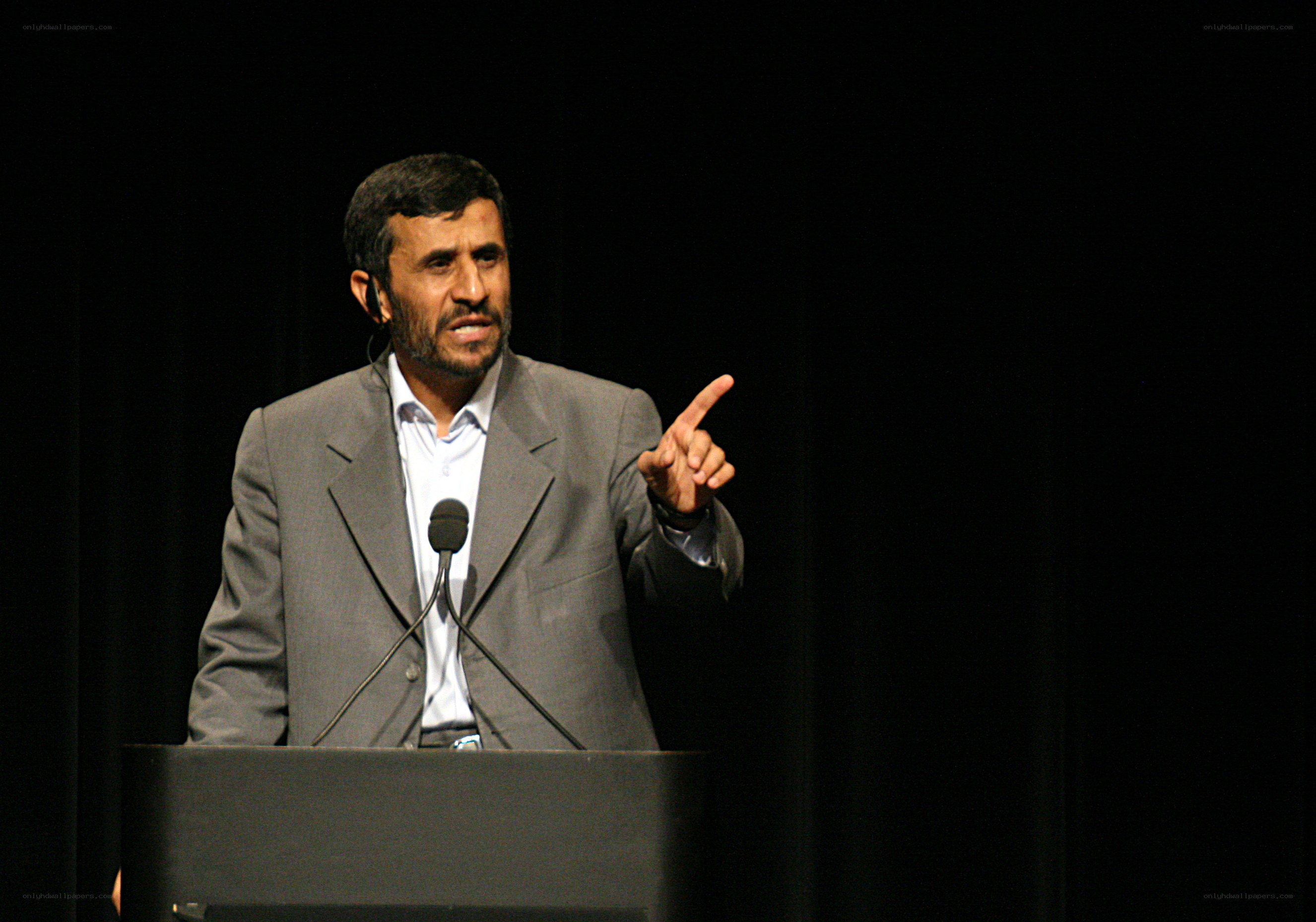 Man speaking at a podium