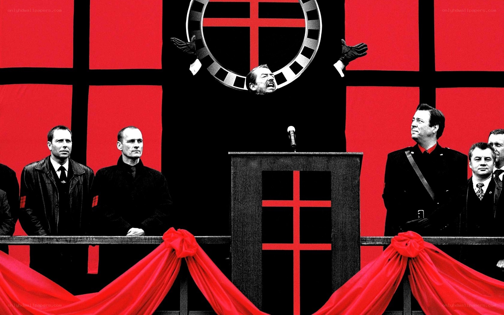 Man speaking at a podium