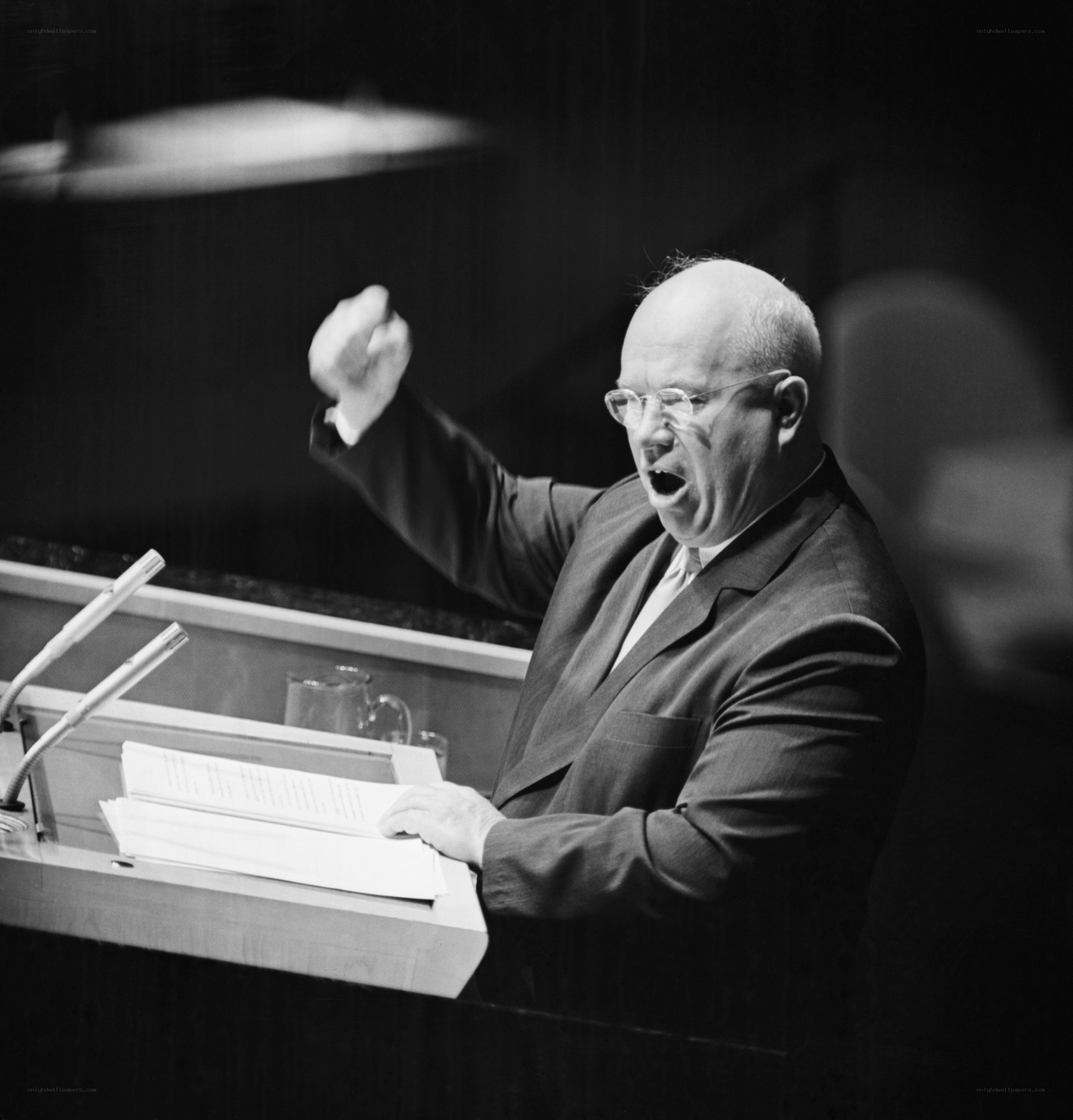 Man speaking at a podium