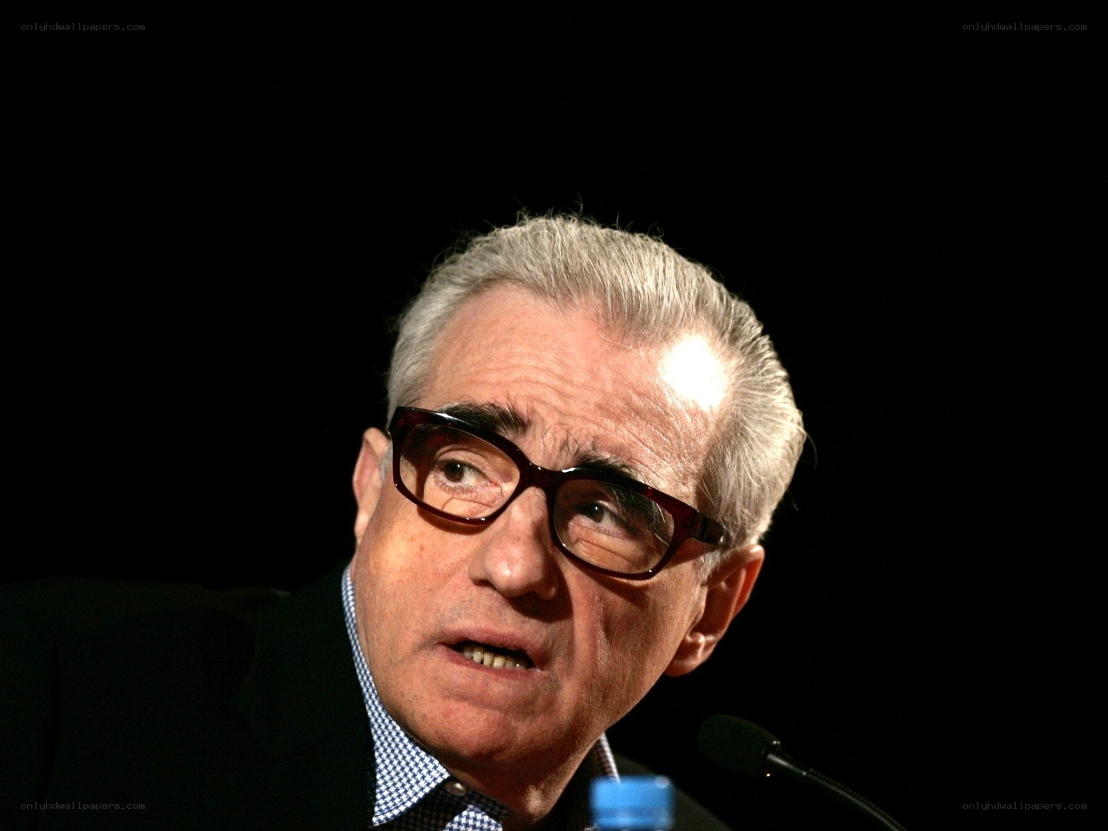 Man speaking at a podium