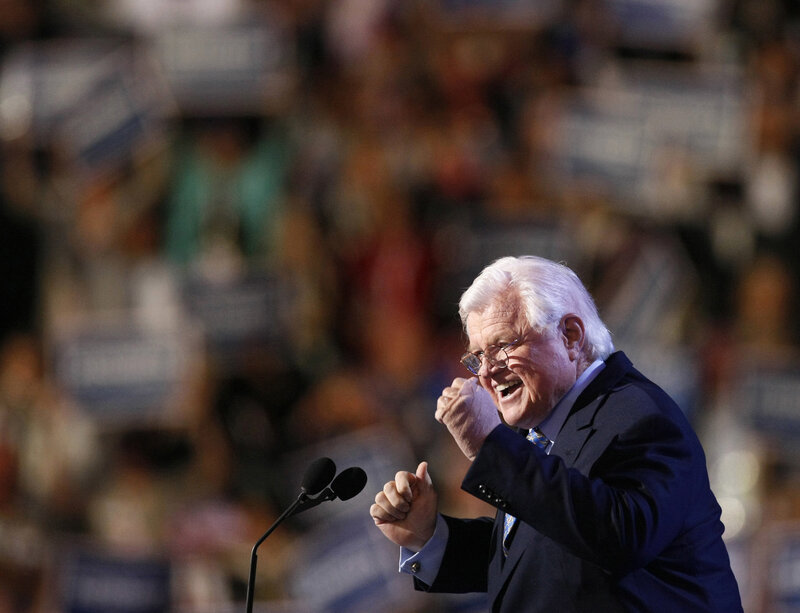 Man speaking at a rally