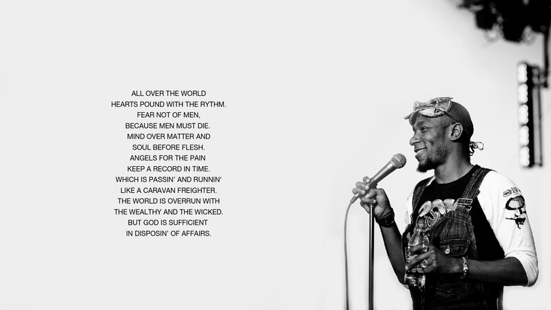 man speaking at microphone