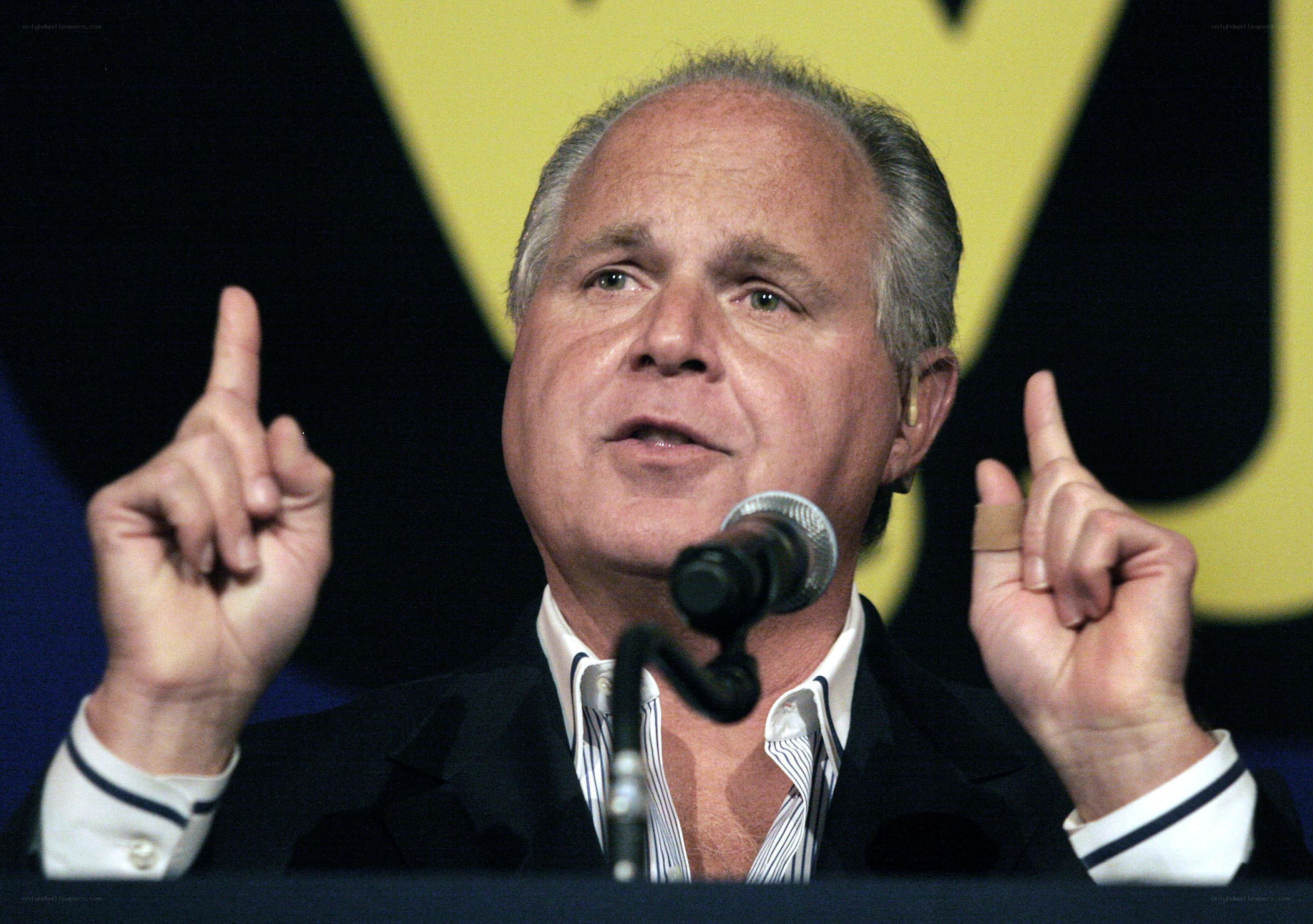man speaking at podium