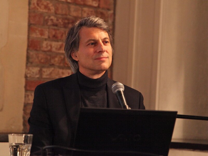 Man Speaking at Podium — Black, Formal, Photograph