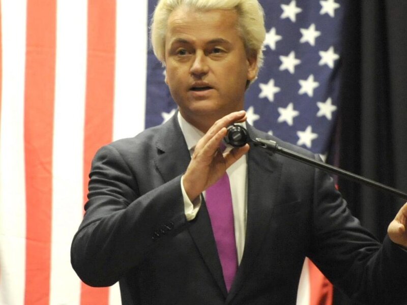 Man Speaking at Podium — Black, Formal