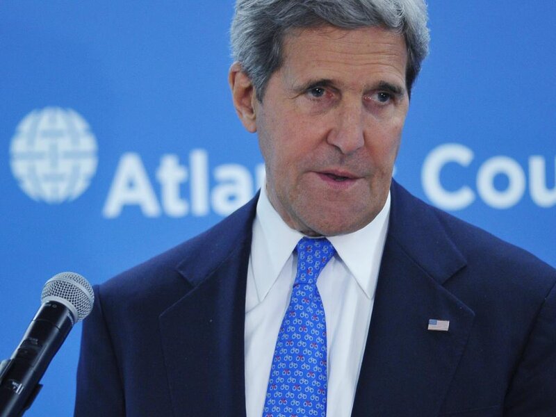 Man Speaking at Podium — Blue, Formal, Photograph