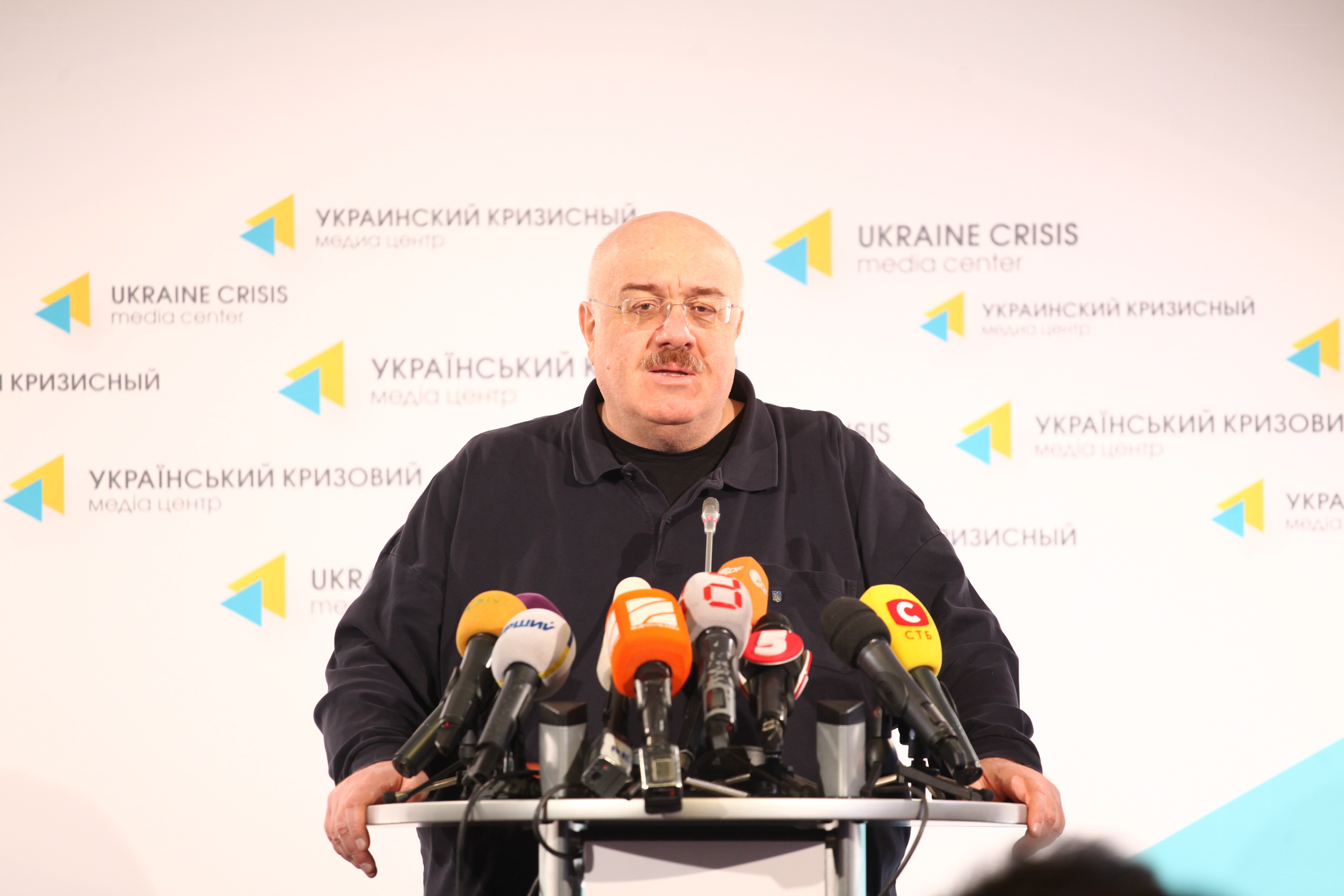 Man speaking at press conference