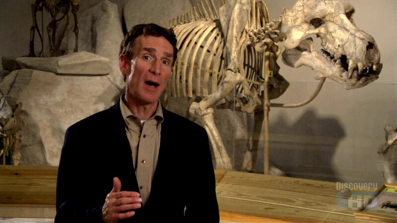 man speaking in museum