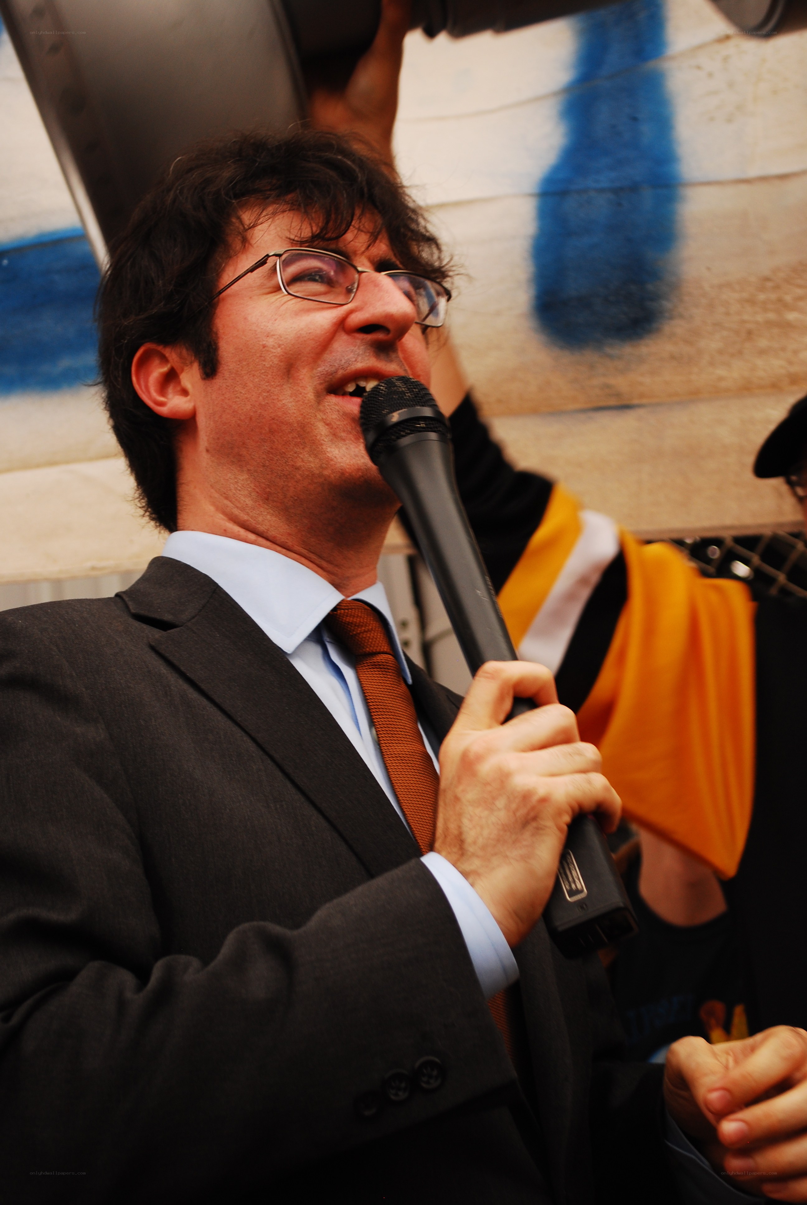 Man speaking into a microphone