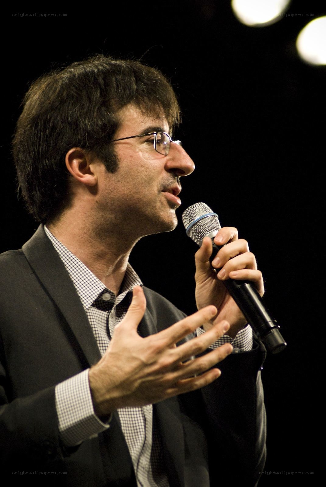 man speaking into microphone